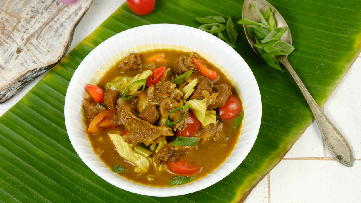 Tongseng kambing is an Indonesian goat meat, mutton or beef stew dish in curry-like soup, with vegetables and sweet soy sauce.